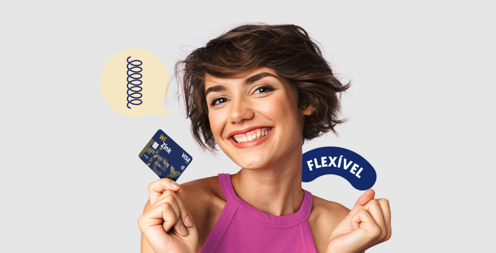 Pessoa segurando Cartão de crédito Wizink Flex fundo cinza