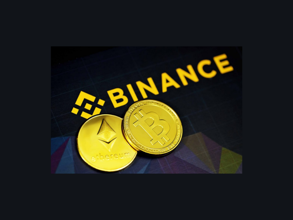 Logotipo Binance com moedas digitais Bitcoin e Ethereum