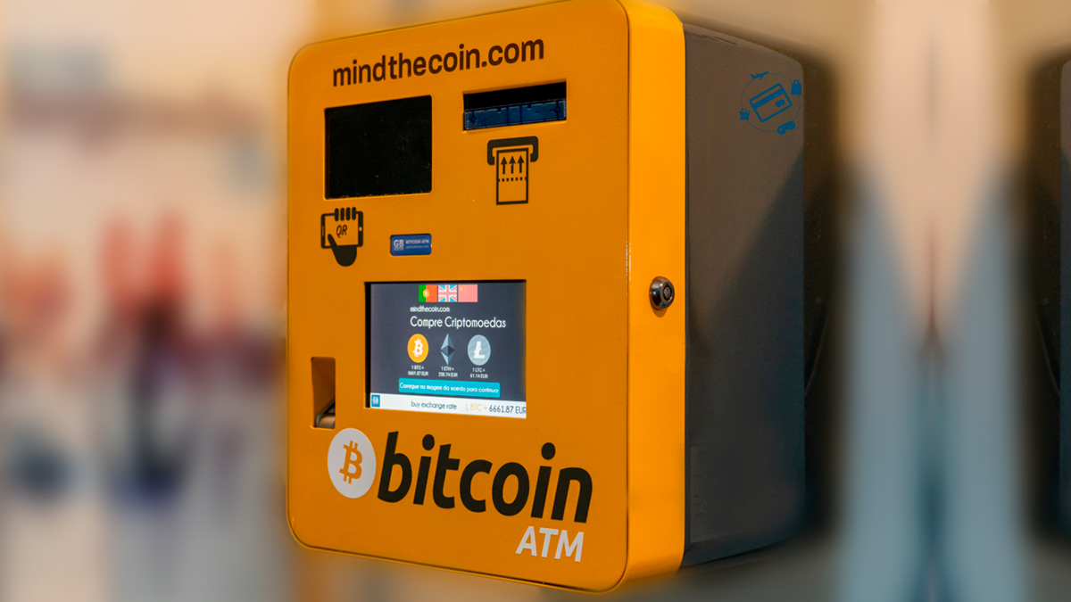 Caixa eletrônico ATM da corretora Mind the Coin, laranja, escrito Bitcoin