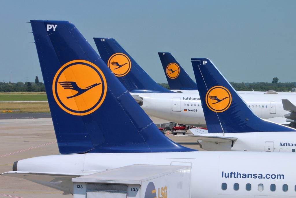 DUSSELDORF, GERMANY - JULY 8: Multiple Lufthansa aircraft wait on July 8, 2013 in Dusseldorf Airport, Germany. Lufthansa Group carried over 103 million passengers in 2012.